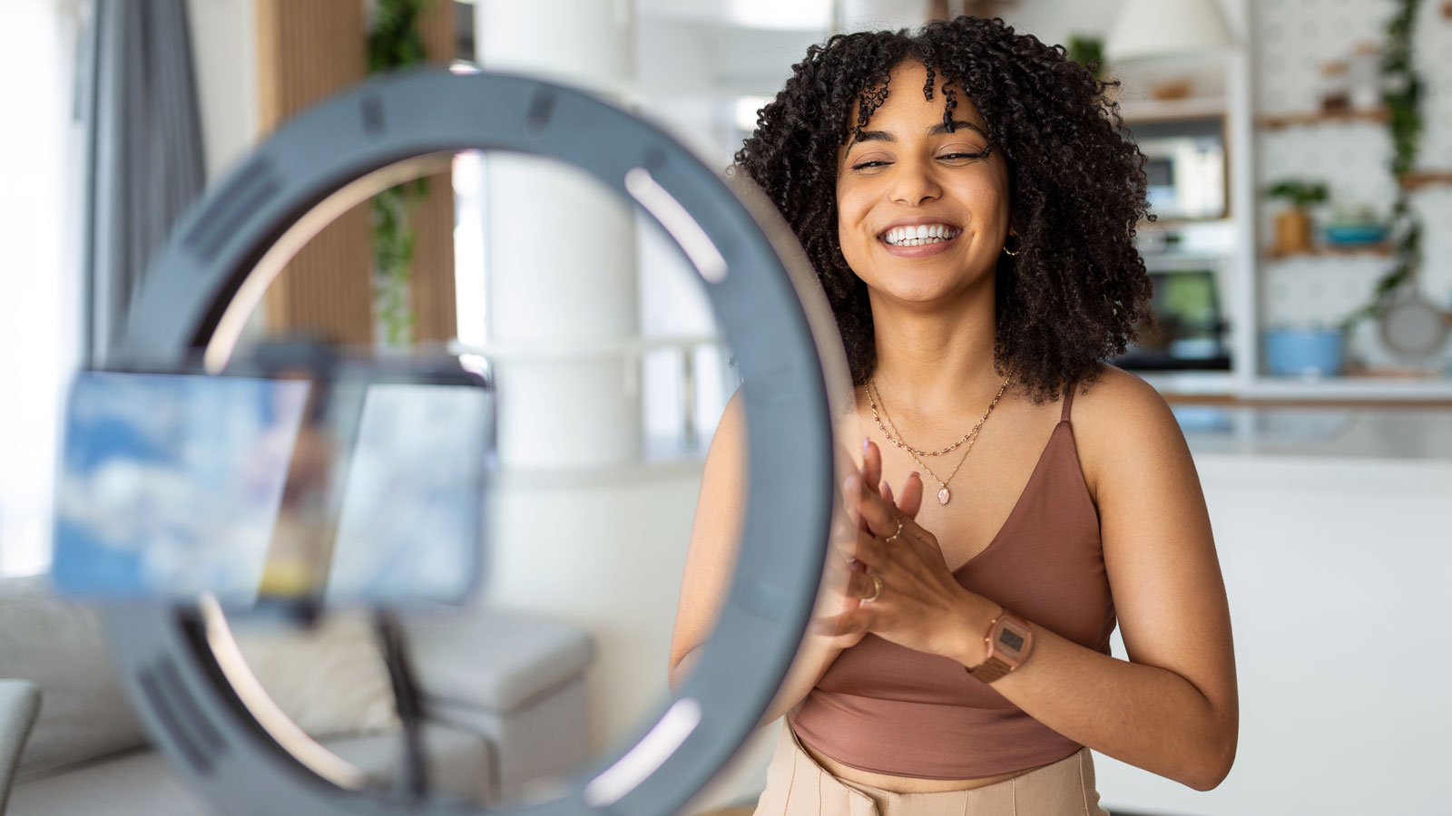 influencer in front of light ring influencer in front of light ring