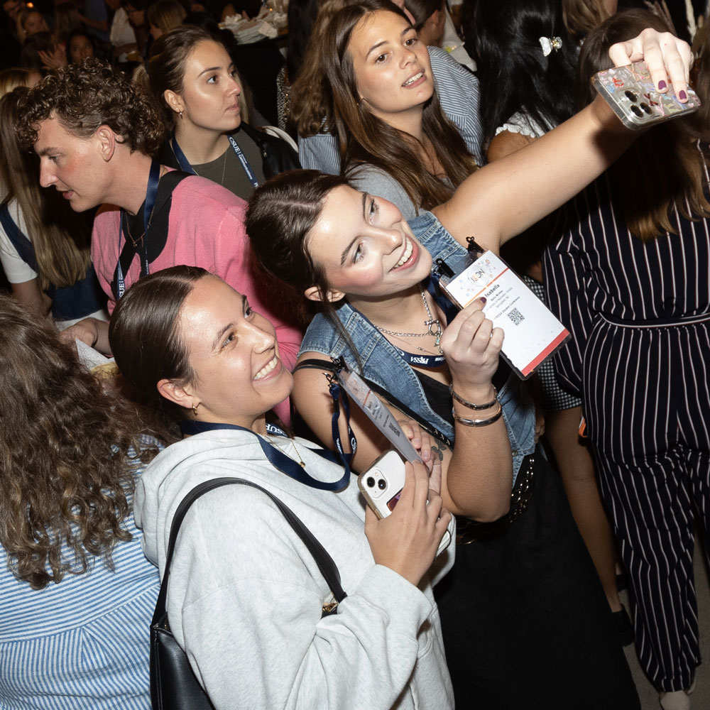 students taking  selfies at PRSSA ICON 2024