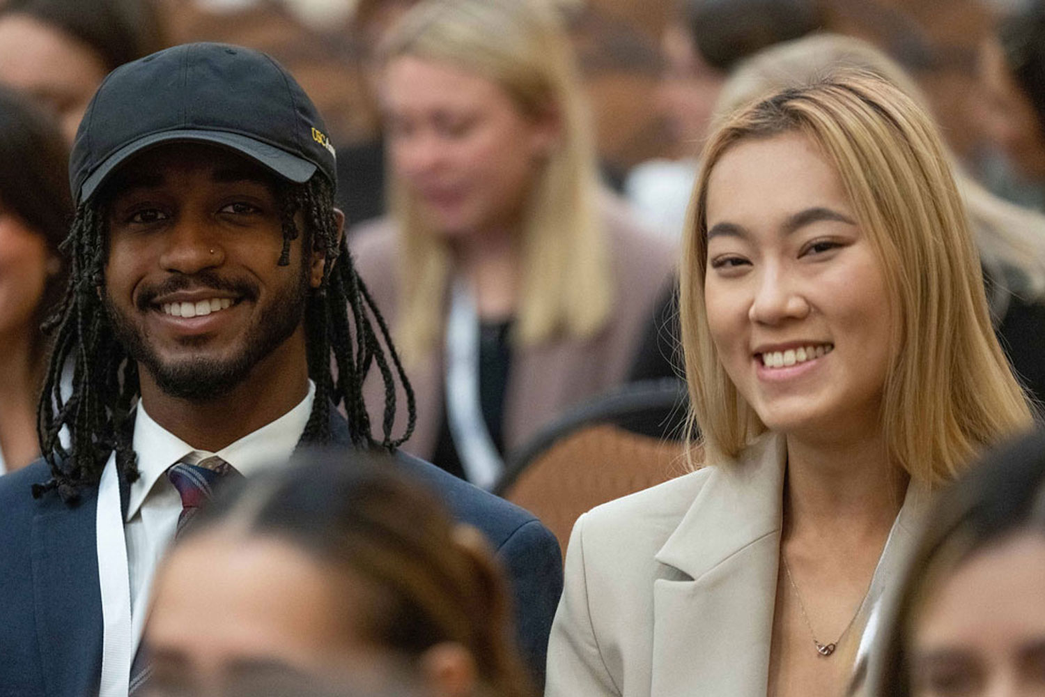 two young professional in audience