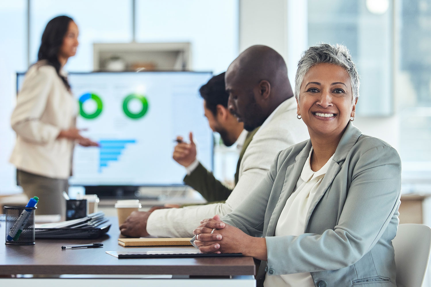 senior woman at conference table