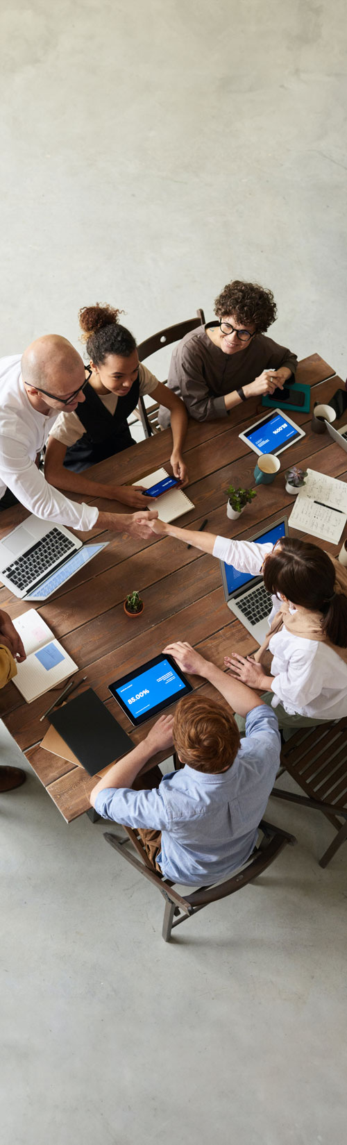 Overhead view of business people at conference table