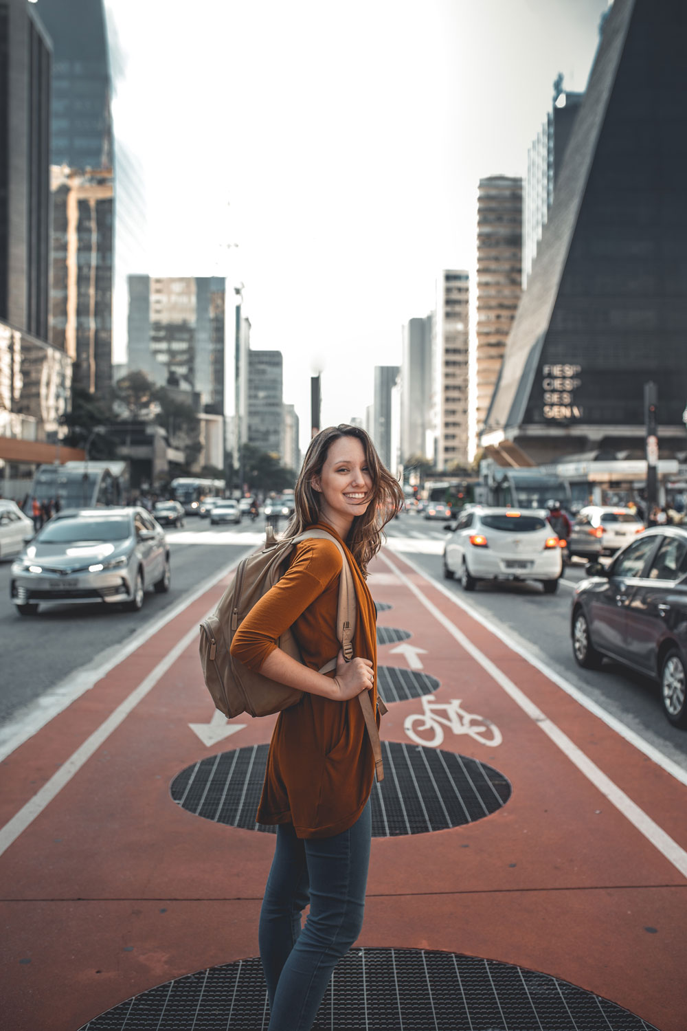 woman standing in city street woman standing in city street